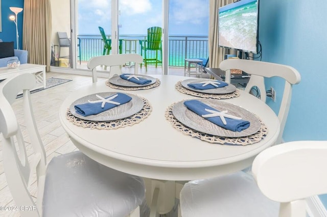 dining area with light hardwood / wood-style flooring