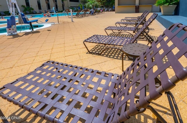 view of patio / terrace featuring a community pool