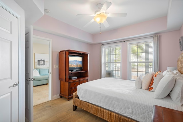 bedroom featuring ceiling fan and light wood-type flooring