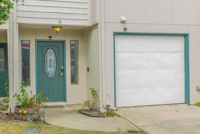 entrance to property with a garage