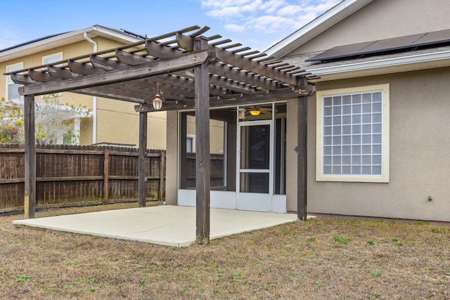 view of patio featuring a sunroom and a pergola