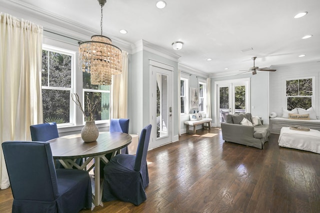 dining area featuring dark hardwood / wood-style floors, french doors, and a healthy amount of sunlight