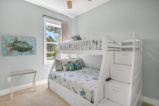 bedroom with ceiling fan and carpet floors