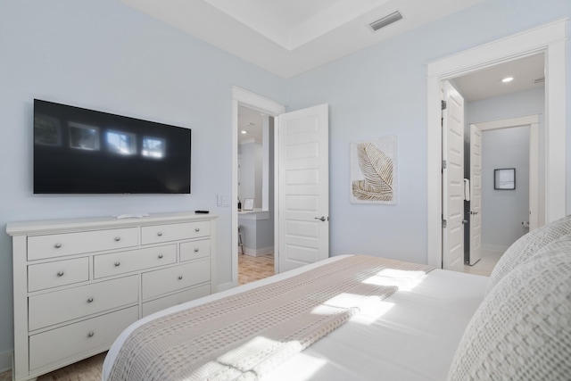 bedroom featuring light hardwood / wood-style floors