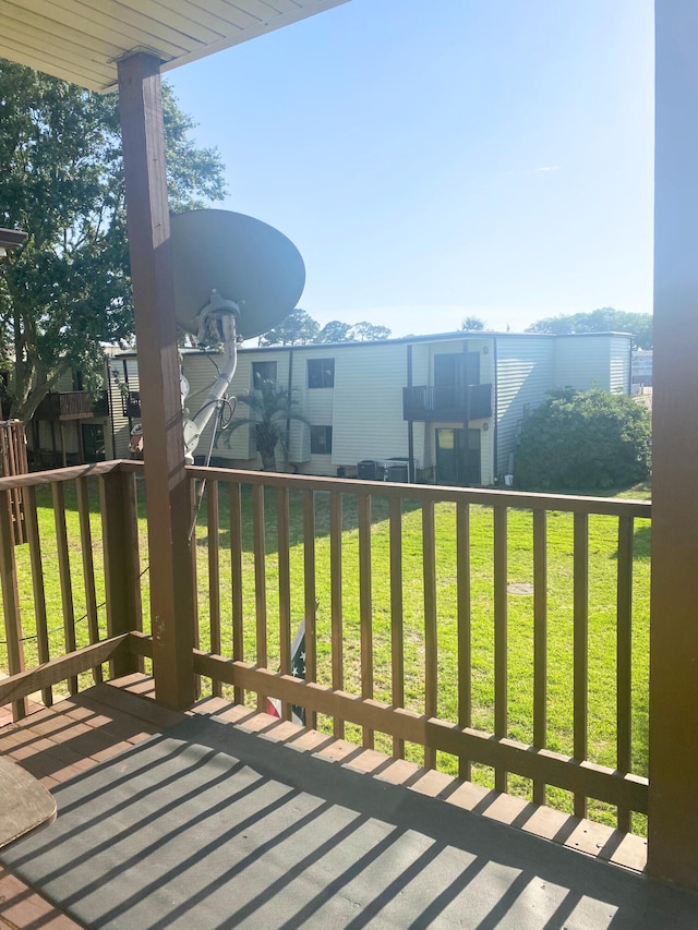 308 Miracle Strip Pkwy Unit 4C, Fort Walton Beach, FL 32548 - view of wooden balcony featuring a deck