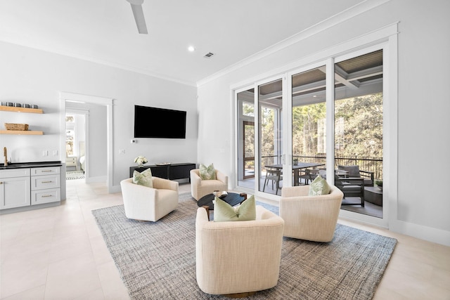 tiled living room with crown molding and wet bar