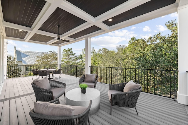 deck featuring an outdoor hangout area and ceiling fan