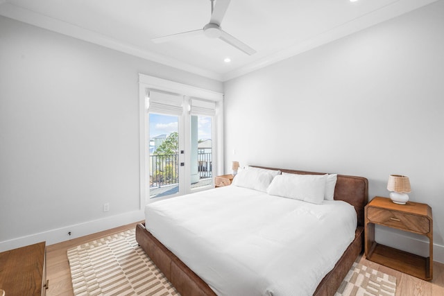 bedroom with ornamental molding, access to outside, ceiling fan, and light wood-type flooring