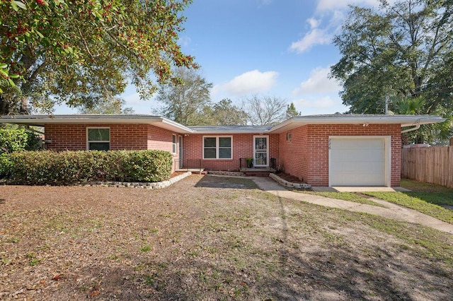 single story home with a garage