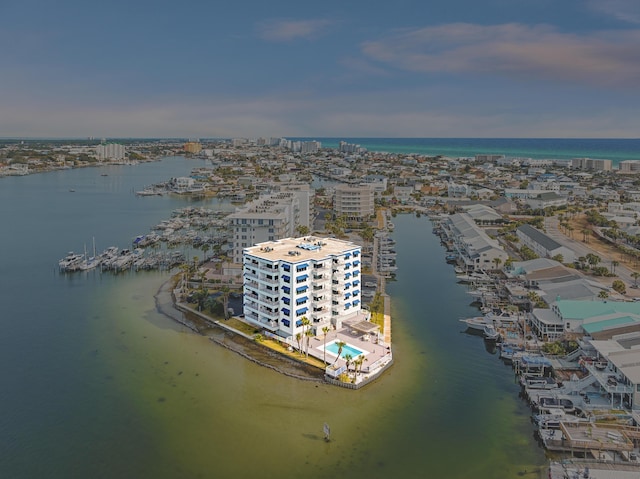 aerial view at dusk with a water view