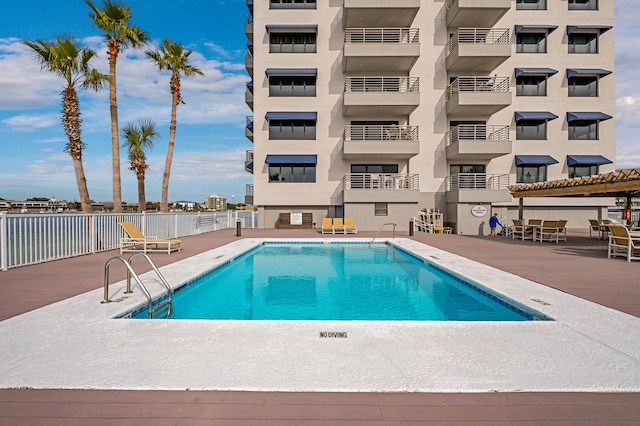 view of pool featuring a patio area