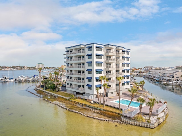 view of property with a water view