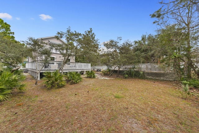 view of yard featuring a deck