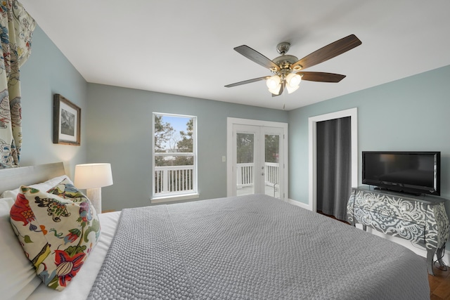 bedroom with access to exterior, french doors, and ceiling fan