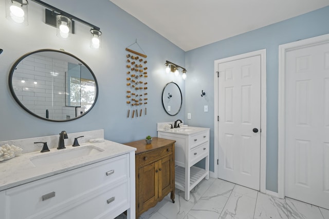 bathroom with walk in shower and vanity