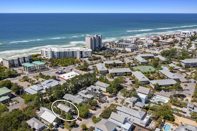 bird's eye view featuring a water view and a view of the beach