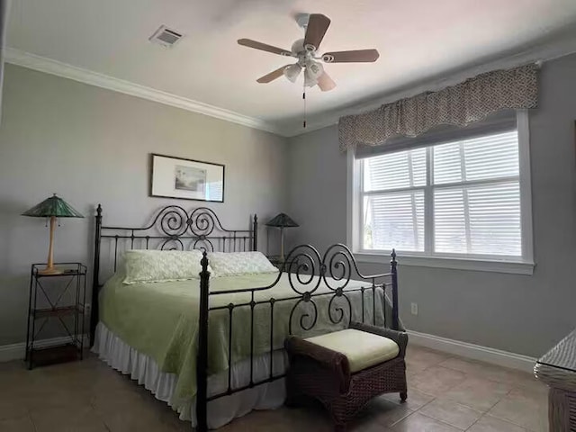 tiled bedroom featuring crown molding and ceiling fan