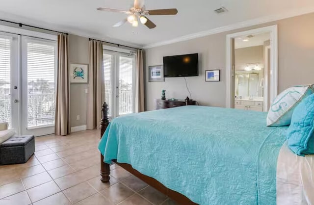 tiled bedroom featuring ornamental molding, ensuite bathroom, access to exterior, and ceiling fan