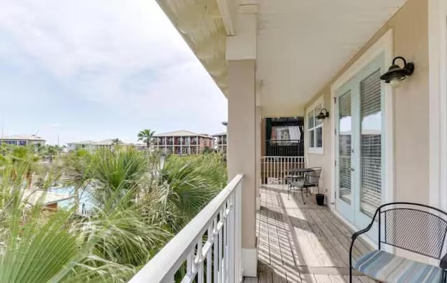 balcony featuring french doors