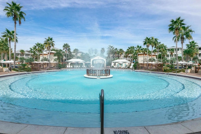 view of swimming pool with a gazebo