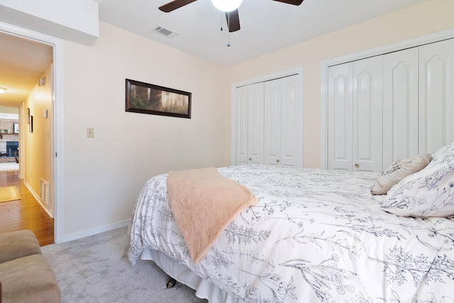 806 Overbrook Dr, Fort Walton Beach, FL 32547 - bedroom with multiple closets, baseboards, carpet flooring, and a ceiling fan