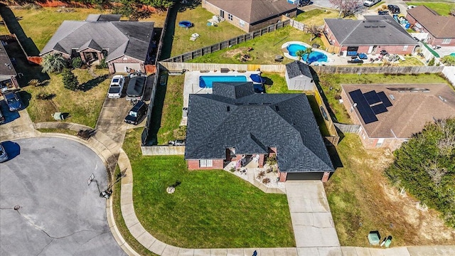 birds eye view of property with a residential view