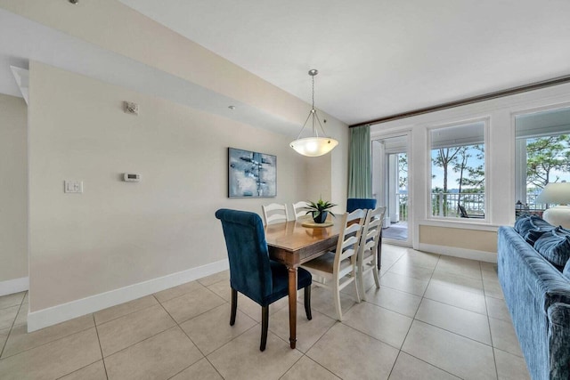 dining area with a healthy amount of sunlight and light tile patterned floors