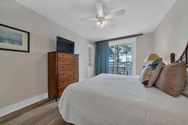 bedroom with hardwood / wood-style flooring and ceiling fan