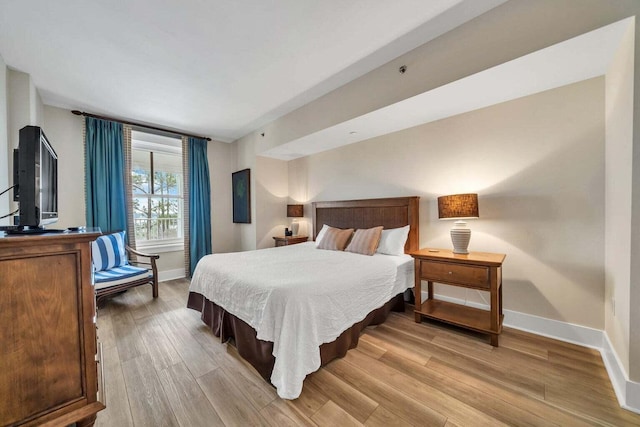 bedroom featuring light hardwood / wood-style floors