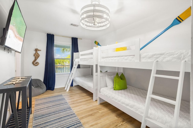 bedroom with wood-type flooring