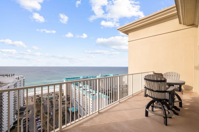 balcony featuring a water view