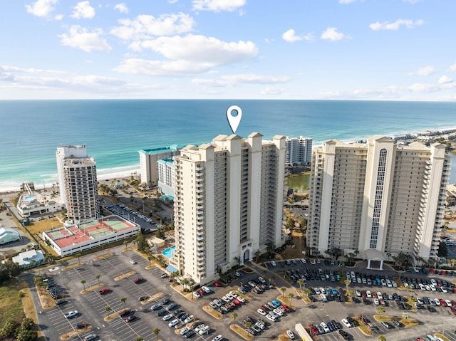 birds eye view of property featuring a view of city and a water view