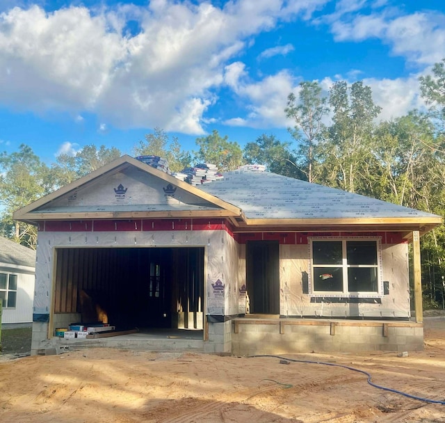 property under construction featuring a garage