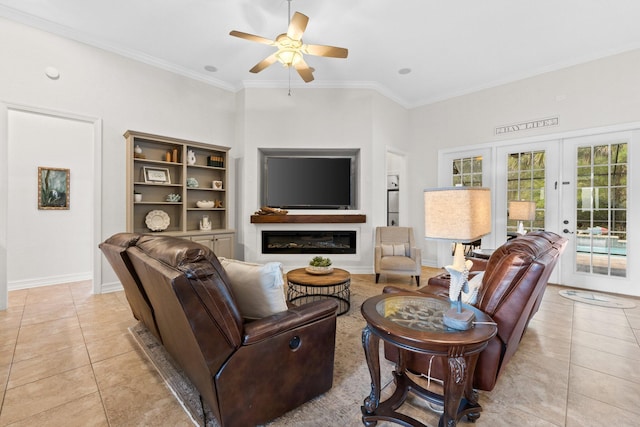 living room with french doors, ceiling fan, ornamental molding, and light tile patterned flooring