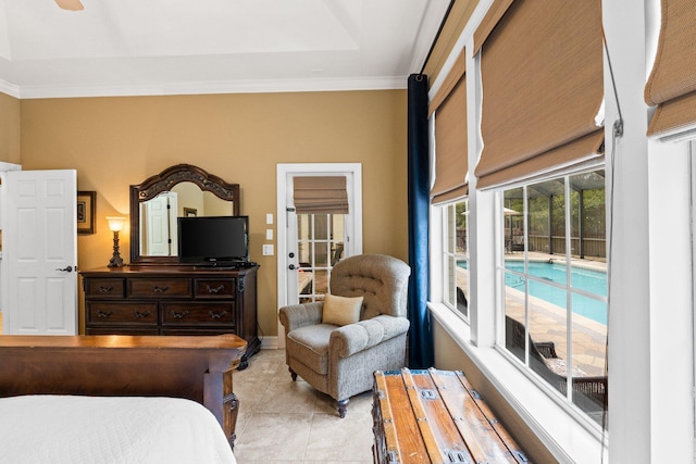 bedroom featuring crown molding, access to exterior, and light tile patterned floors