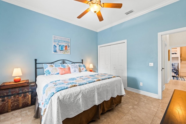 tiled bedroom with ceiling fan, ornamental molding, and a closet