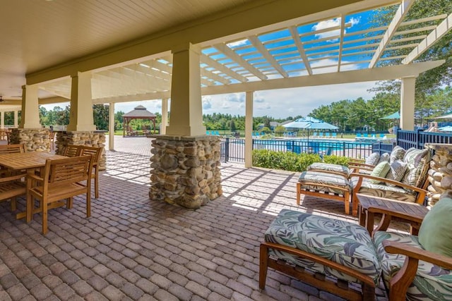 view of patio / terrace with a pergola and a gazebo