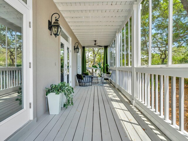 wooden deck featuring covered porch