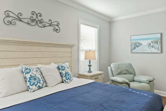 bedroom with ornamental molding