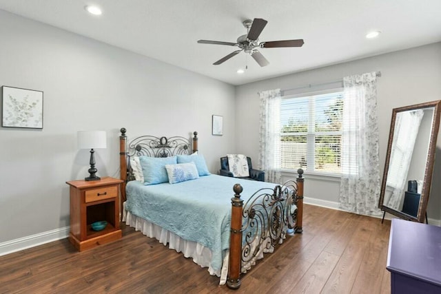 bedroom featuring dark wood-type flooring and ceiling fan