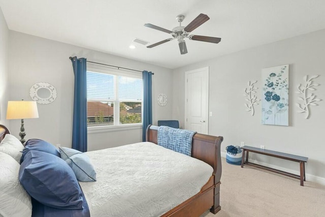 carpeted bedroom with ceiling fan