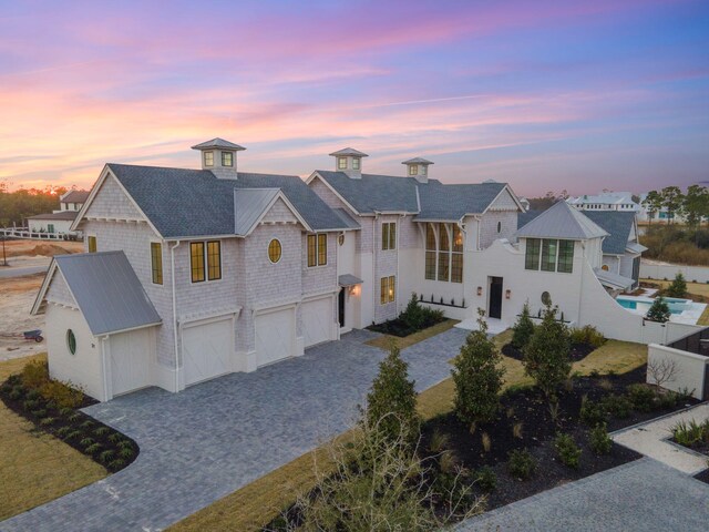 view of front of property featuring a garage