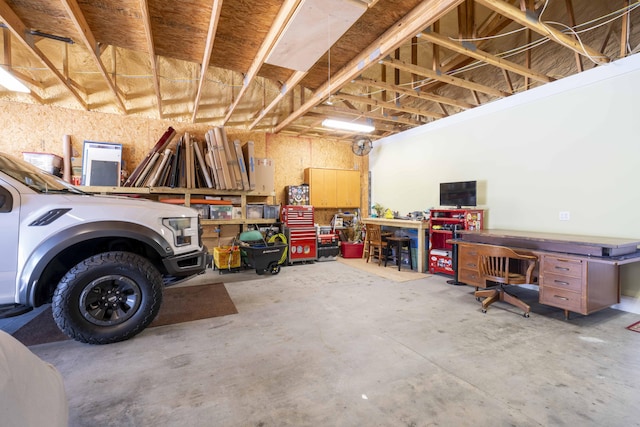 garage featuring a workshop area