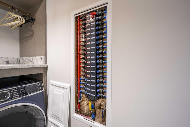 wine area with washer / clothes dryer