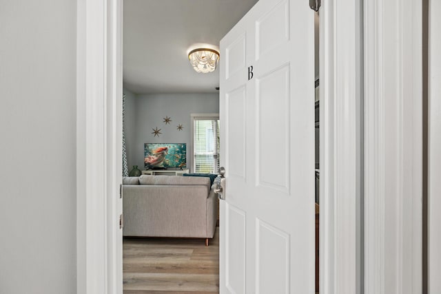 hall with light wood-style flooring