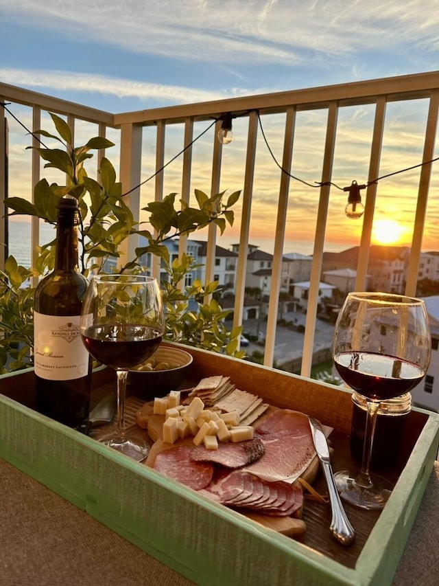 view of balcony at dusk