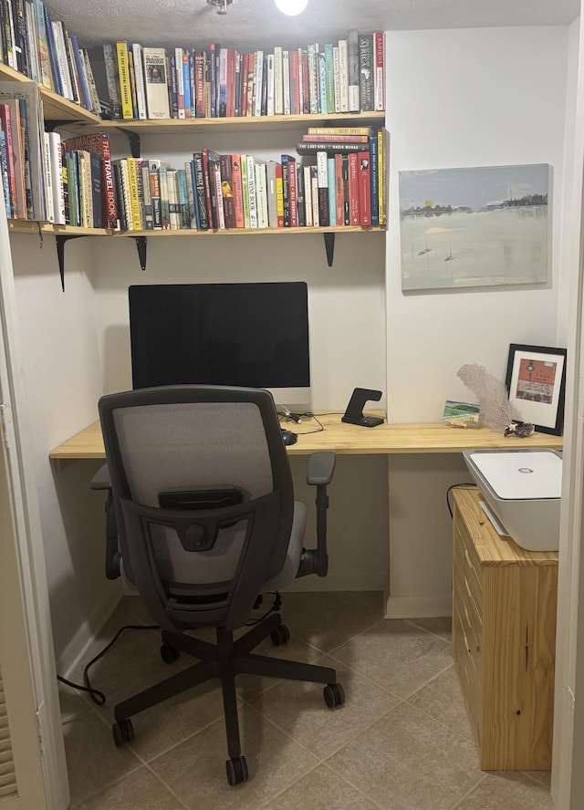 office with light tile patterned flooring