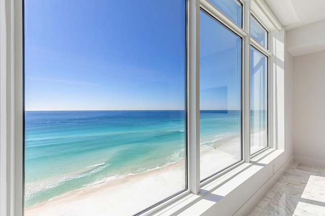 interior space featuring a view of the beach