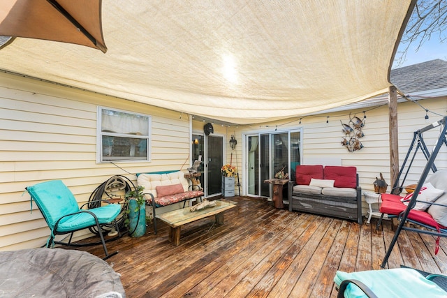 wooden deck featuring an outdoor hangout area