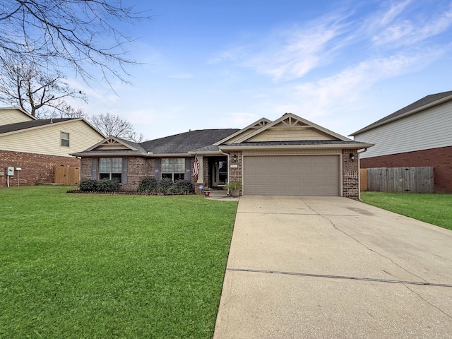 single story home featuring a garage and a front yard